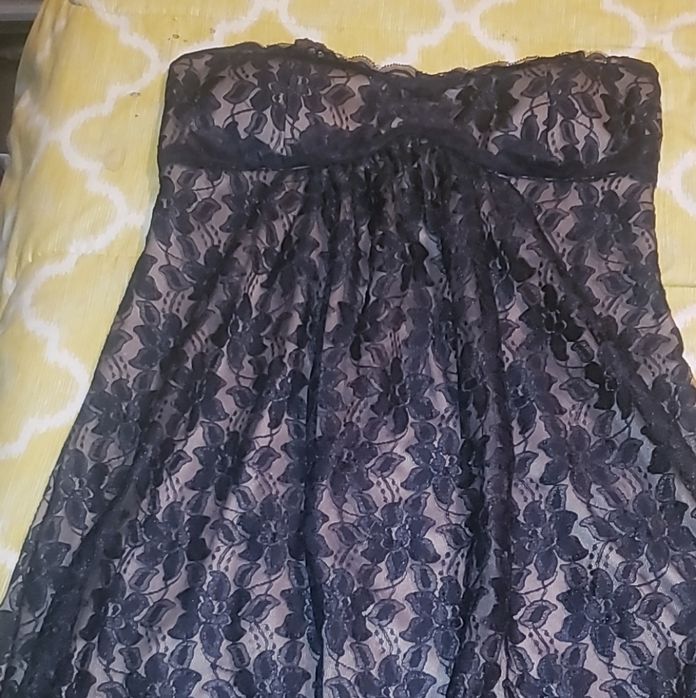 Tan dress covered in beautiful black lace